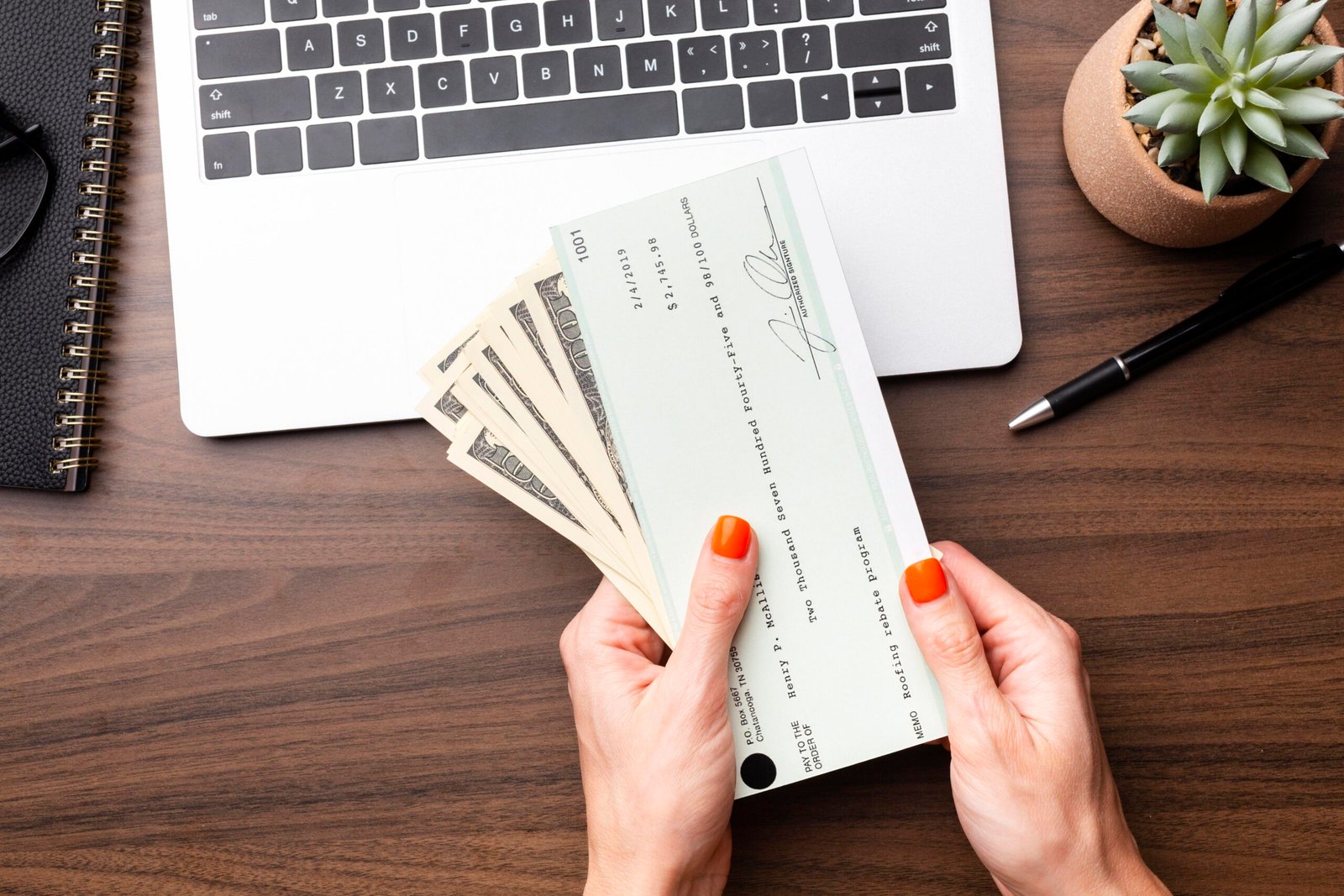 US Treasury stimulus check surrounded by happy American families,
